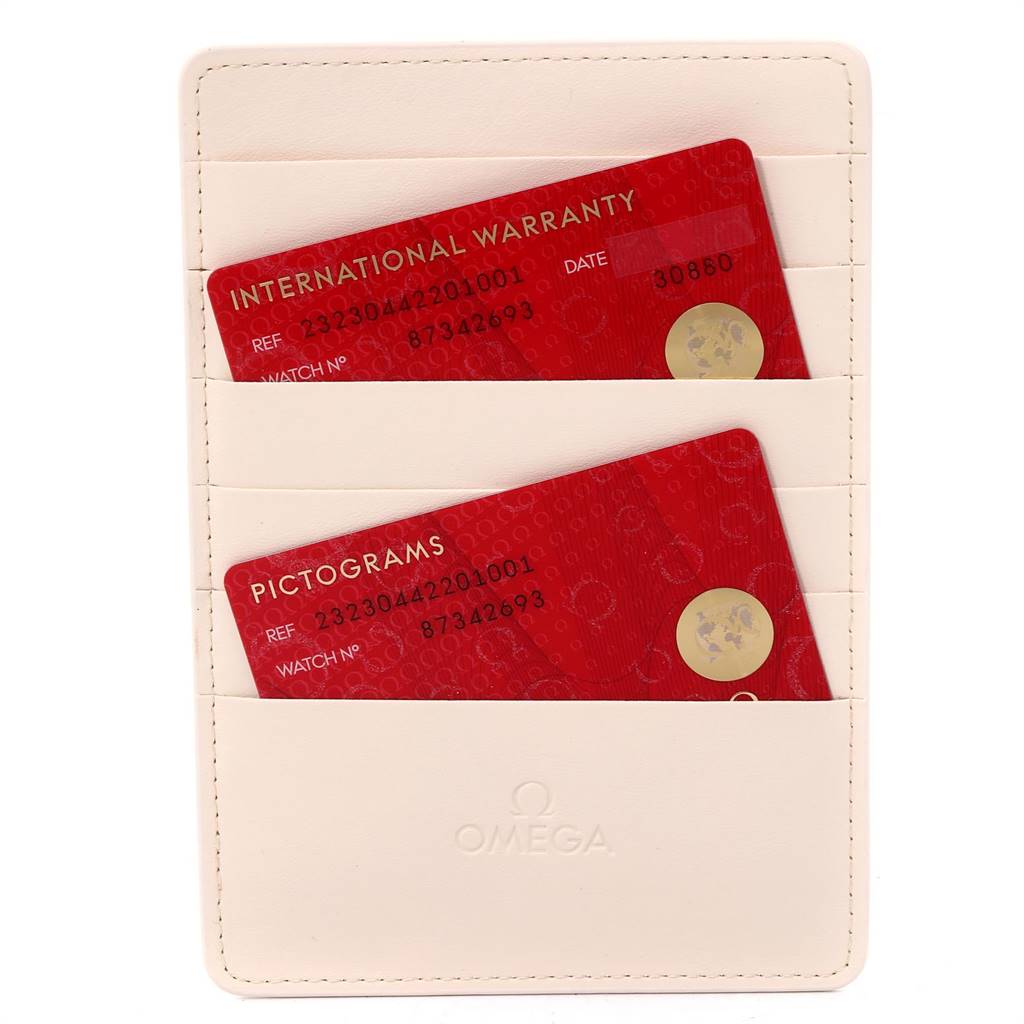 The image shows two Omega Planet Ocean 232.30.44.22.01.001 Men
s Stainless Steel Black Dial 232.30.44.22.01.001 Men
s Stainless Steel Black Dial watch cards (International Warranty and Pictogram) in a cream cardholder.