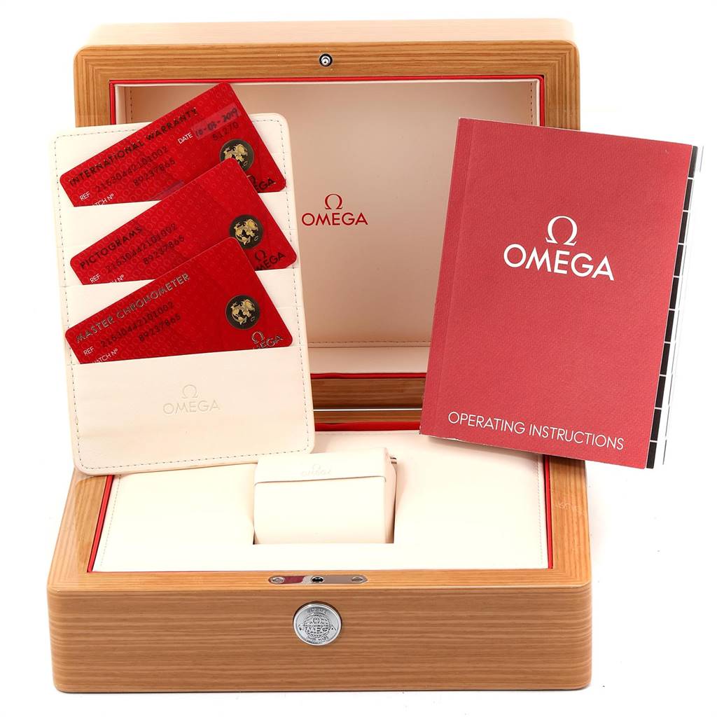 The image shows the box, international warranty cards, and operating instructions for the Omega Planet Ocean 215.30.44.21.01.002 Men
s Stainless Steel Black Dial 215.30.44.21.01.002 Men
s Stainless Steel Black Dial watch.