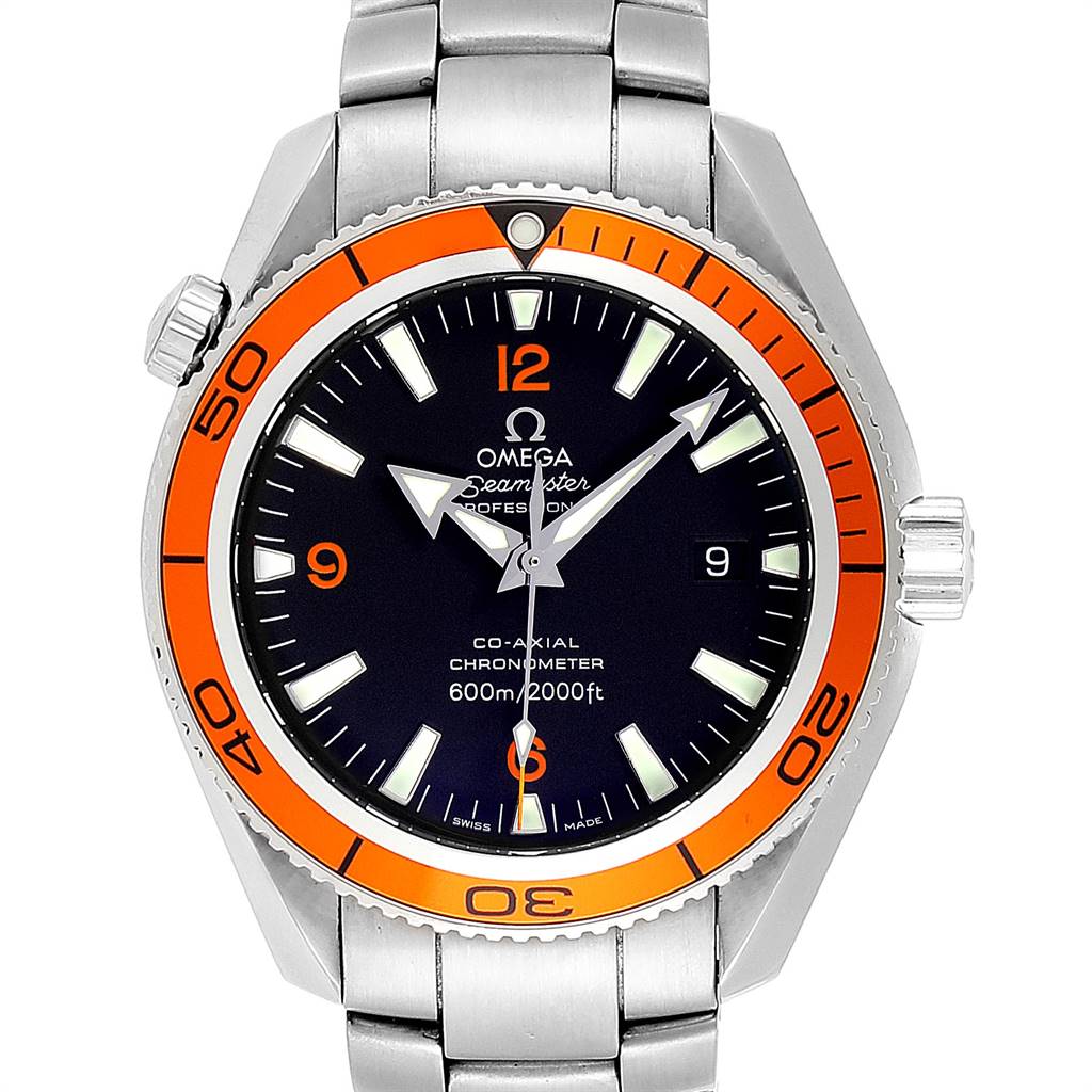 The image shows a front view of the Omega Seamaster Planet Ocean watch, highlighting its orange bezel, black dial, and stainless steel bracelet.