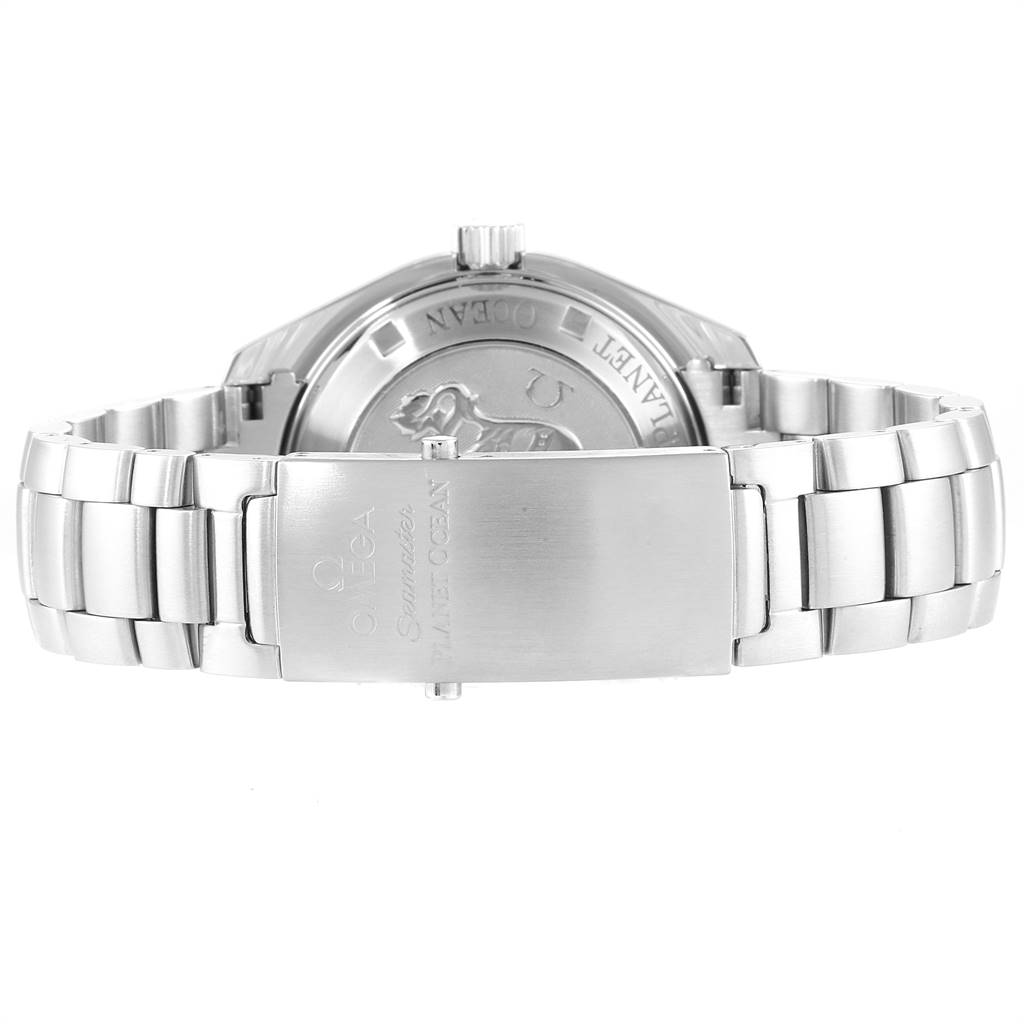 The image shows the back case, clasp, and bracelet of the Omega Seamaster Planet Ocean watch.