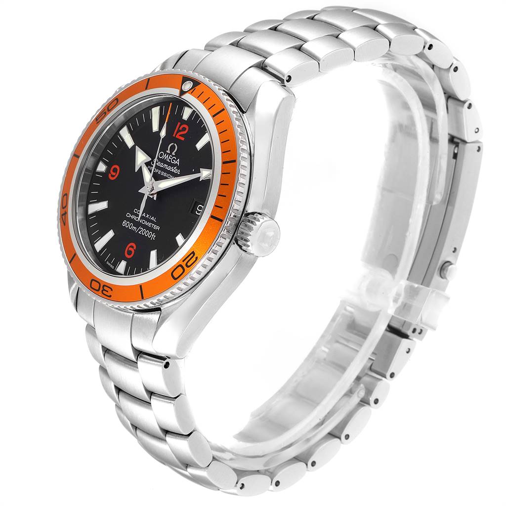 The image shows a side angle of the Omega Planet Ocean 2209.50.00 Men
s Stainless Steel Black Dial 2209.50.00 Men
s Stainless Steel Black Dial watch, highlighting the face, orange bezel, and stainless steel bracelet.