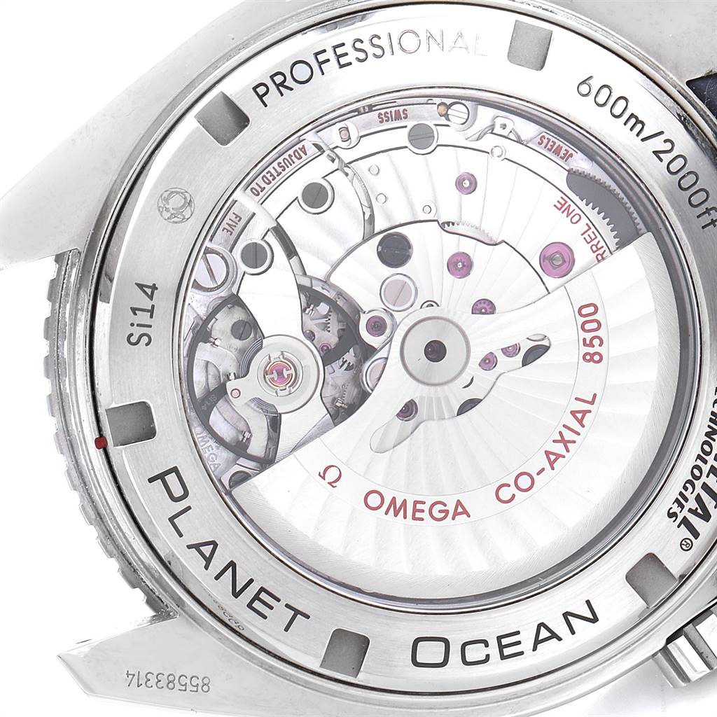 The image shows the back of the Omega Planet Ocean 232.92.46.21.03.001 Men's Titanium Blue Dial 232.92.46.21.03.001 Men's Titanium Blue Dial watch, revealing its internal mechanical components.