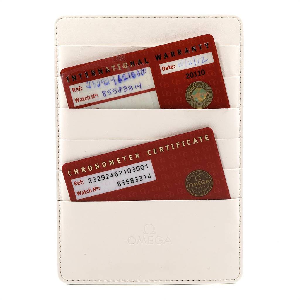 The image shows the International Warranty and Chronometer Certificate cards for the Omega Planet Ocean 232.92.46.21.03.001 Men's Titanium Blue Dial 232.92.46.21.03.001 Men's Titanium Blue Dial watch in a white cardholder.