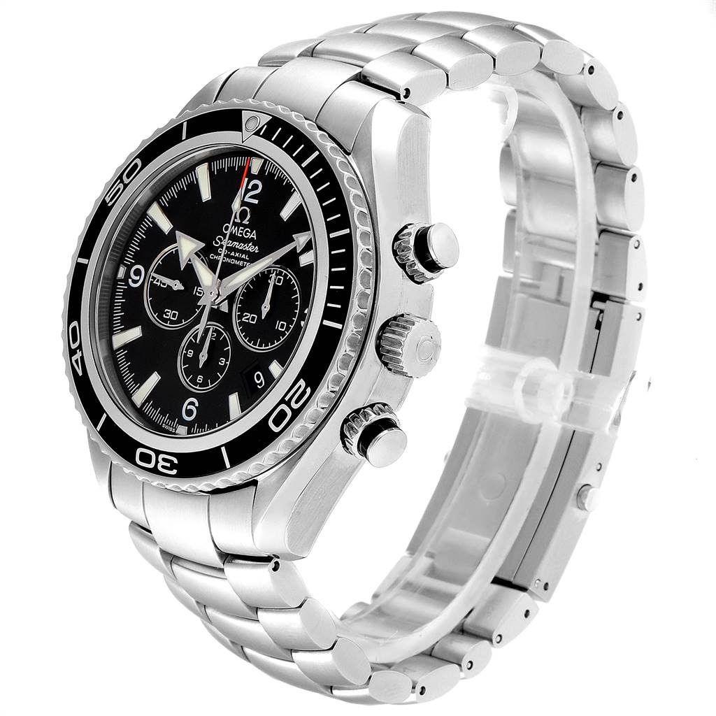 The image shows a side angle of an Omega Planet Ocean 2210.50.00 Men's Stainless Steel Black Dial 2210.50.00 Men's Stainless Steel Black Dial watch, highlighting the bezel, dial, crown, and bracelet.