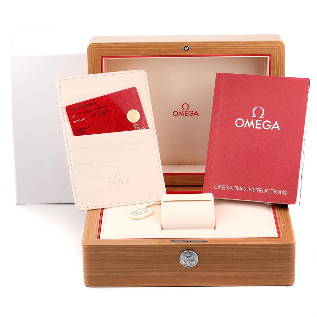 The image shows the packaging, cardholder, cards, operating instructions, and display box for the Omega Planet Ocean 232.92.42.21.03.001 Men
s Titanium Blue Dial 232.92.42.21.03.001 Men
s Titanium Blue Dial watch.