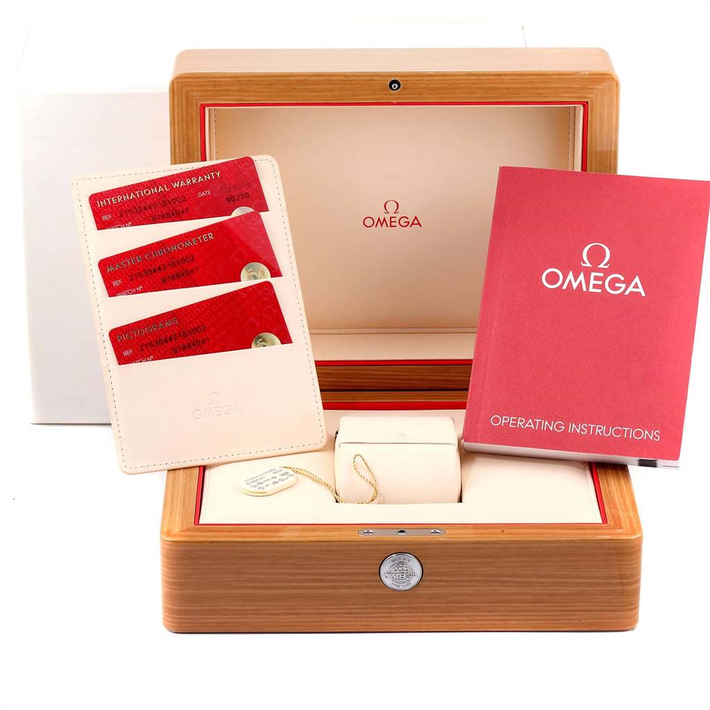 The image shows the packaging box, warranty cards, and manual for the Omega Planet Ocean 215.30.44.21.01.002 Men
s Stainless Steel Black Dial 215.30.44.21.01.002 Men
s Stainless Steel Black Dial watch.