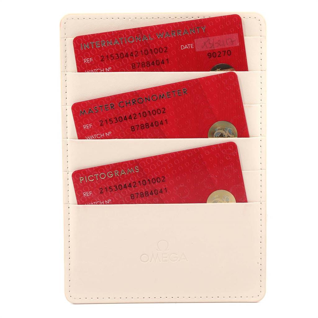 The image shows three red cards labeled "INTERNATIONAL WARRANTY," "MASTER CHRONOMETER," and "PICTOGRAMS" for the Omega Planet Ocean 215.30.44.21.01.002 Men
s Stainless Steel Black Dial 215.30.44.21.01.002 Men
s Stainless Steel Black Dial model.