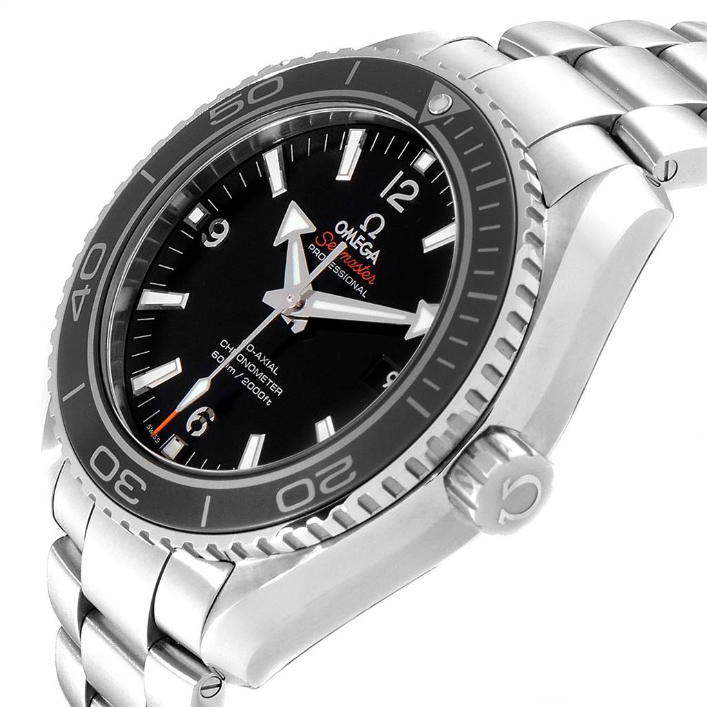 The image shows a side angle of the Omega Seamaster Planet Ocean watch, highlighting the face, bezel, crown, and stainless steel bracelet.