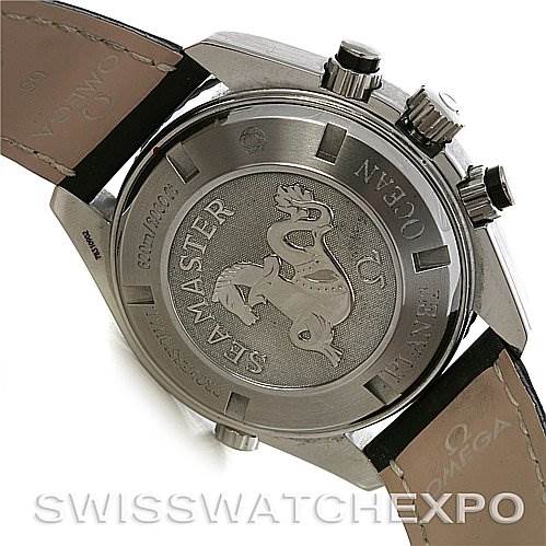 The image shows the back case and partial leather straps of the Omega Planet Ocean 2910.50.81 Men
s Stainless Steel Black Dial 2910.50.81 Men
s Stainless Steel Black Dial watch, revealing the Seamaster engraving and crown side.