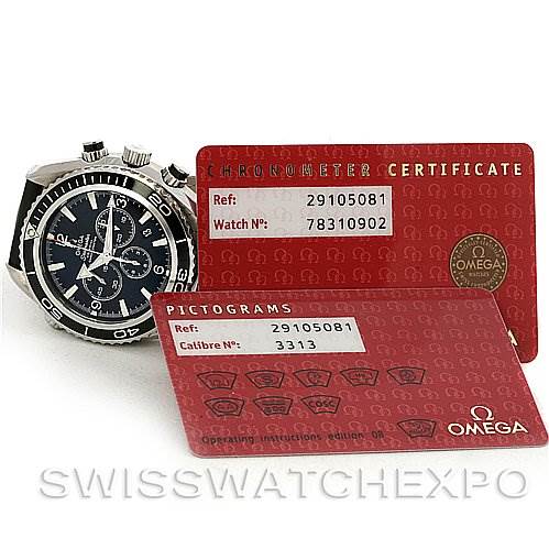 The image shows an Omega Planet Ocean 2910.50.81 Men
s Stainless Steel Black Dial 2910.50.81 Men
s Stainless Steel Black Dial watch at a slight angle alongside its chronometer certificate and pictograms card.