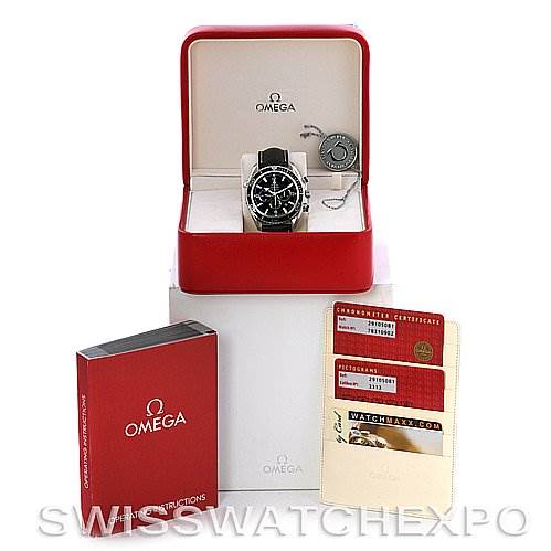 The image shows the Omega Planet Ocean 2910.50.81 Men
s Stainless Steel Black Dial 2910.50.81 Men
s Stainless Steel Black Dial watch, its open display box, a chronometer certificate, a tag, and an instruction manual.
