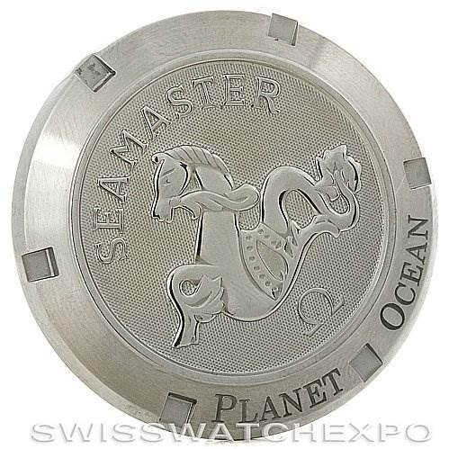This image shows the case back of an Omega Seamaster Planet Ocean watch.