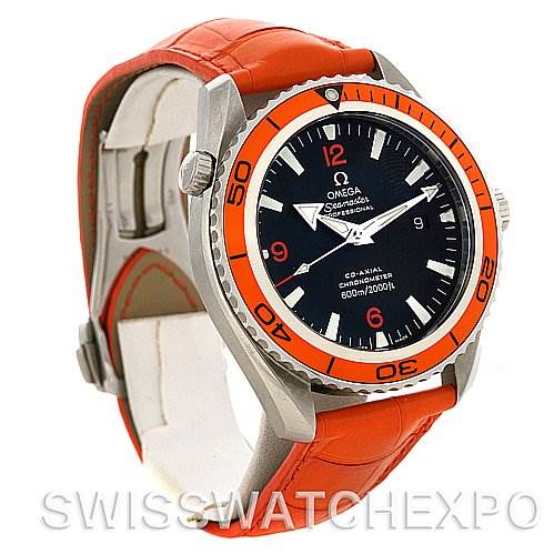 The image shows an angled side view of the Omega Planet Ocean 2908.50.38 Men's Stainless Steel Black Dial 2908.50.38 Men's Stainless Steel Black Dial watch, highlighting its orange bezel and matching orange strap.