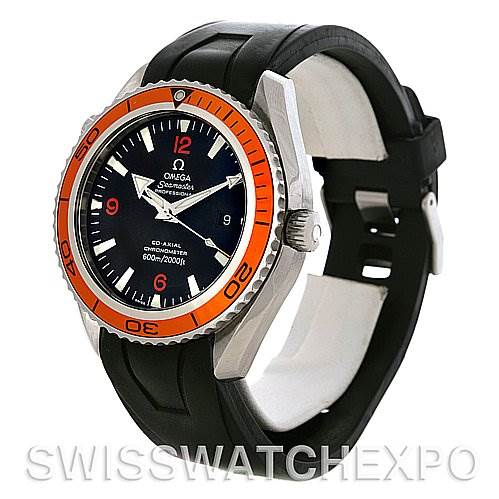 The image shows an Omega Planet Ocean 2908.50.91 Men
s Stainless Steel Black Dial 2908.50.91 Men
s Stainless Steel Black Dial watch from a side angle, highlighting the orange bezel, black dial, and rubber strap.