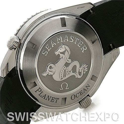 The image shows the backside of the Omega Planet Ocean 2908.50.91 Men
s Stainless Steel Black Dial 2908.50.91 Men
s Stainless Steel Black Dial Seamaster watch, highlighting the engraved case back and part of the black strap.