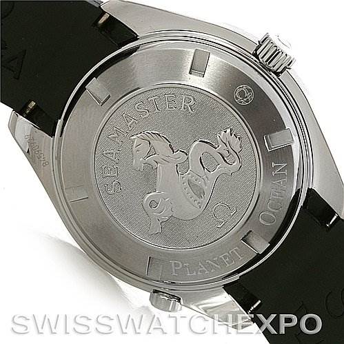 The image shows the back case of the Omega Seamaster Planet Ocean watch at an oblique angle, highlighting the engravings.