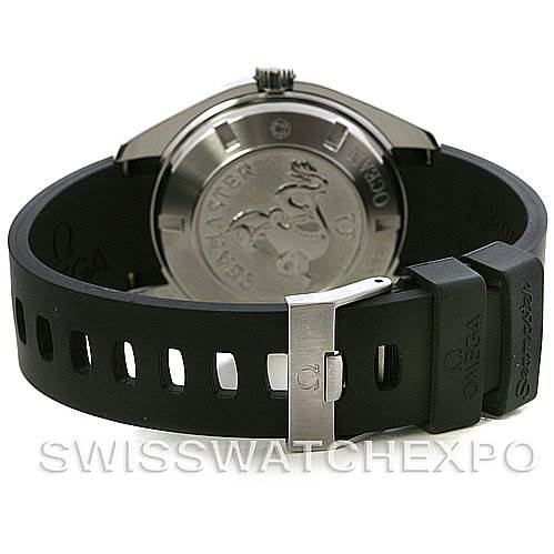 The image shows the back of an Omega Planet Ocean 2900.50.91 Men
s Stainless Steel Black Dial 2900.50.91 Men
s Stainless Steel Black Dial watch, focusing on the case back and the black rubber strap with a clasp.