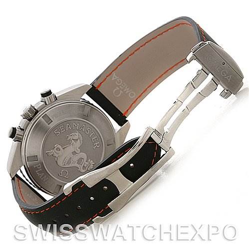 This image shows the back casing and clasp of an Omega Planet Ocean 2910.51.82 Men's Stainless Steel Black Dial 2910.51.82 Men's Stainless Steel Black Dial Seamaster watch, highlighting the watch's engraved back and partially open strap.