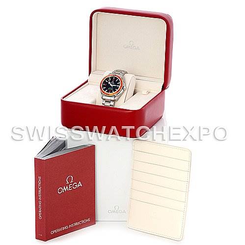 The image shows an Omega Planet Ocean 2909.50 Men's Stainless Steel Black Dial 2909.50 Men's Stainless Steel Black Dial watch with its red box, operating instructions booklet, and a cardholder.