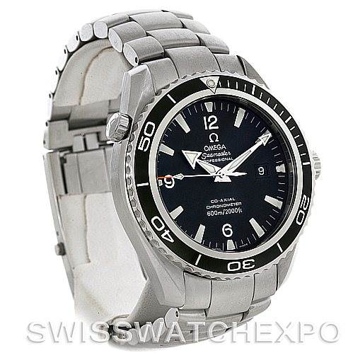 The image shows an Omega Seamaster Planet Ocean watch at a slight angle, highlighting its face, bezel, crown, and metal bracelet.