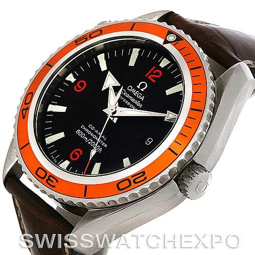 The image shows an Omega Planet Ocean 2908.50.91 Men's Stainless Steel Black Dial 2908.50.91 Men's Stainless Steel Black Dial watch from a side angle, highlighting the dial, crown, bezel, and part of the strap.