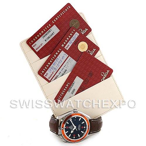 The image shows an Omega Planet Ocean 2908.50.91 Men's Stainless Steel Black Dial 2908.50.91 Men's Stainless Steel Black Dial watch with a brown strap and its warranty, pictogram, and chronometer certificates.