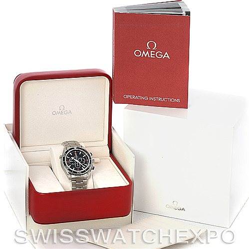 The image shows the Omega Planet Ocean 2210.51.00 Men's Stainless Steel Black Dial 2210.51.00 Men's Stainless Steel Black Dial watch in its box with an operating instructions booklet, viewed from the front angle.