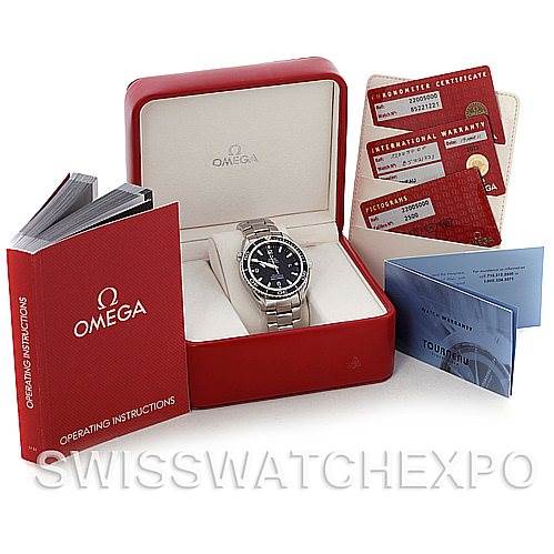 This image shows an Omega Planet Ocean 2200.50.00 Men's Stainless Steel Black Dial 2200.50.00 Men's Stainless Steel Black Dial watch in its box with manuals and warranty cards.