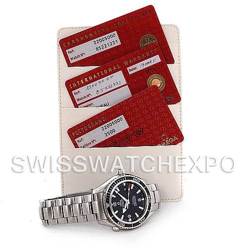 The image shows an Omega Planet Ocean 2200.50.00 Men's Stainless Steel Black Dial 2200.50.00 Men's Stainless Steel Black Dial watch along with warranty and chronometer certification cards.