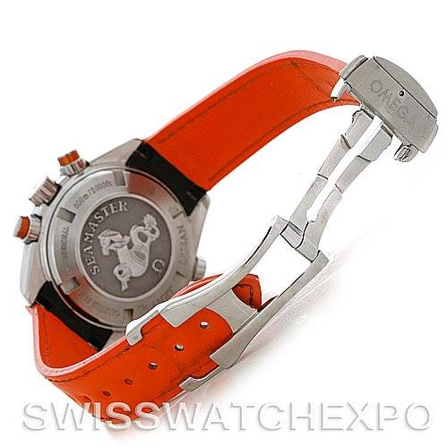 The image shows the back case and clasp of an Omega Planet Ocean 222.32.38.50.01.003 Women
s Stainless Steel Black Dial 222.32.38.50.01.003 Women
s Stainless Steel Black Dial watch, featuring an orange strap.