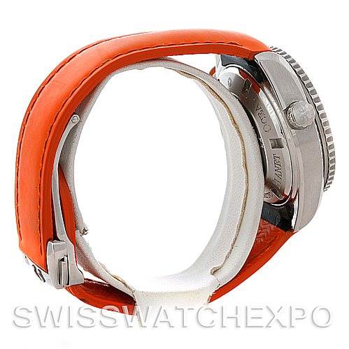 The image shows a side view of an Omega Planet Ocean 222.32.38.50.01.003 Women
s Stainless Steel Black Dial 222.32.38.50.01.003 Women
s Stainless Steel Black Dial watch with an orange strap and visible crown and caseback.