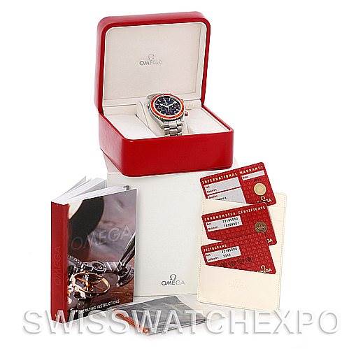 The image shows the Omega Planet Ocean 2218.50.00 Men's Stainless Steel Black Dial 2218.50.00 Men's Stainless Steel Black Dial watch at a slight angle in its box, alongside manuals, booklets, and authenticity cards.