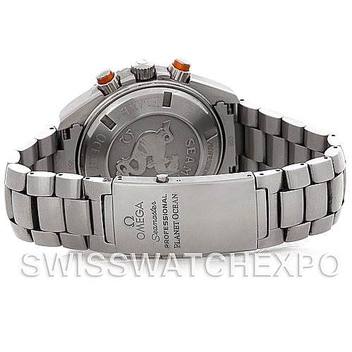 The image shows the back case and bracelet of the Omega Planet Ocean 2218.50.00 Men's Stainless Steel Black Dial 2218.50.00 Men's Stainless Steel Black Dial watch from a rear angle, highlighting the clasp and engraved details.