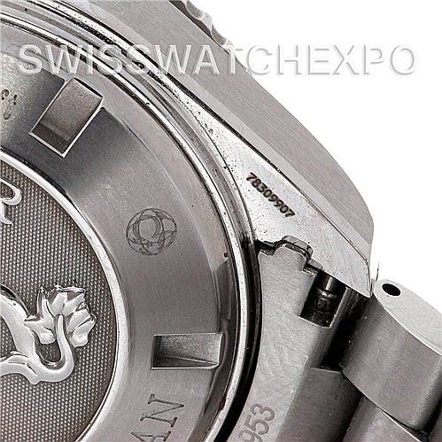 This image shows a close-up of the case back, part of the bracelet, and the serial number of the Omega Planet Ocean 2218.50.00 Men's Stainless Steel Black Dial 2218.50.00 Men's Stainless Steel Black Dial watch.