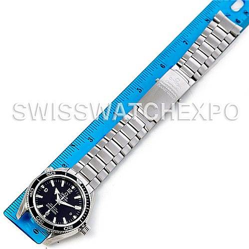 The Omega Planet Ocean 2201.50.00 Men
s Stainless Steel Black Dial 2201.50.00 Men
s Stainless Steel Black Dial watch is shown from a top-down angle, displaying its dial, bezel, and bracelet against a ruler.