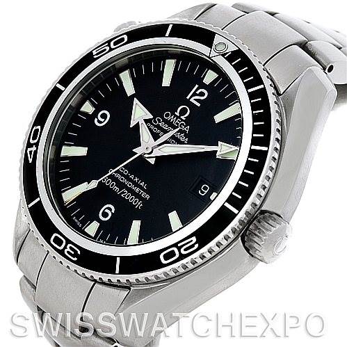 The image shows an Omega Planet Ocean 2201.50.00 Men
s Stainless Steel Black Dial 2201.50.00 Men
s Stainless Steel Black Dial watch at an angled view, highlighting the bezel, face, crown, and part of the bracelet.