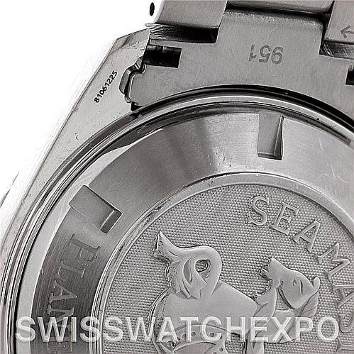 The image shows the back case of the Omega Planet Ocean 2208.50.00 Men's Stainless Steel Black Dial 2208.50.00 Men's Stainless Steel Black Dial watch, focusing on the engraved emblem and surrounding details.
