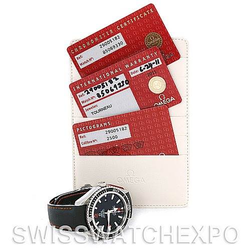 The image shows an Omega Planet Ocean 2900.51.82 Men's Stainless Steel Black Dial 2900.51.82 Men's Stainless Steel Black Dial watch positioned in front of the warranty card, certificate, and pictogram card.