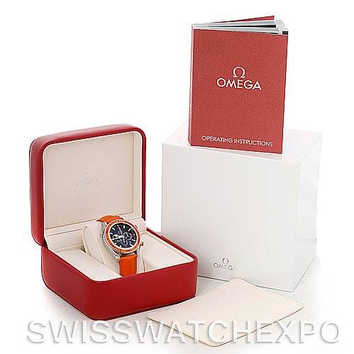 The image shows an Omega Planet Ocean 2918.50.83 Men
s Stainless Steel Black Dial 2918.50.83 Men
s Stainless Steel Black Dial watch in its open red box, accompanied by the operating instructions and outer white box.