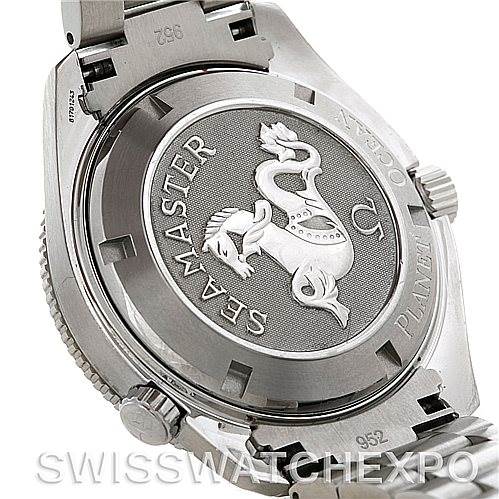 The image shows the back case and clasp of an Omega Planet Ocean 2209.50.00 Men
s Stainless Steel Black Dial 2209.50.00 Men
s Stainless Steel Black Dial Seamaster watch, highlighting the engraved logo.