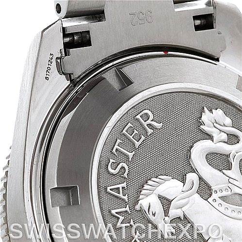 The image shows the close-up of the back case of an Omega Planet Ocean 2209.50.00 Men
s Stainless Steel Black Dial 2209.50.00 Men
s Stainless Steel Black Dial watch, highlighting the Seamaster engraving and part of the clasp.