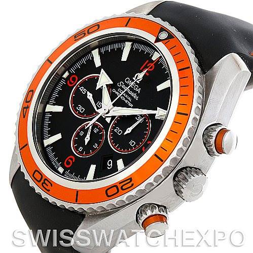 The image shows an Omega Planet Ocean 2918.50.82 Men's Stainless Steel Black Dial 2918.50.82 Men's Stainless Steel Black Dial watch at an angled view, highlighting the orange bezel, black dial, and crown.