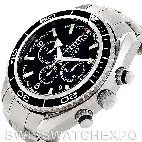 The image shows a Planet Ocean model by Omega at a side angle, highlighting its bezel, chronograph dials, and crown.