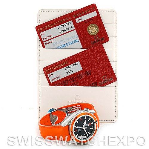 The image shows an Omega Planet Ocean 2909.50.83 Men
s Stainless Steel Black Dial 2909.50.83 Men
s Stainless Steel Black Dial watch with an orange strap, warranty cards, and a holder for the cards.