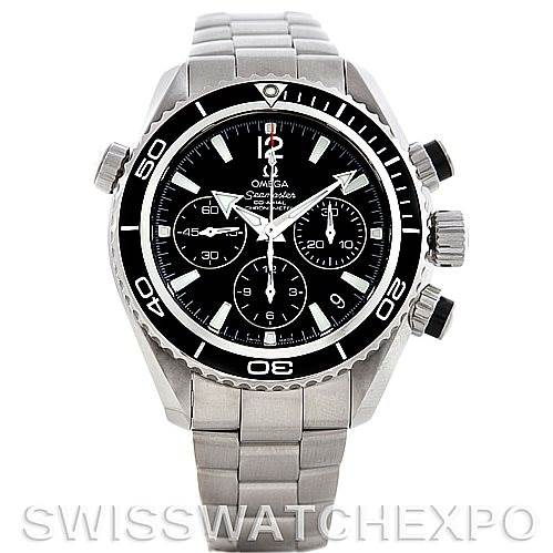 The image shows a front view of the Omega Planet Ocean 22230385001001 Stainless Steel Black Dial 22230385001001 Stainless Steel Black Dial watch, highlighting its bezel, dial, chronograph subdials, and bracelet.