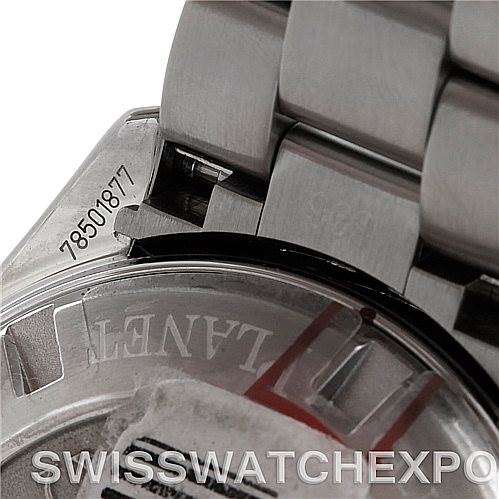 The image shows the serial number and part of the bracelet and case back of the Omega Planet Ocean 22230385001001 Stainless Steel Black Dial 22230385001001 Stainless Steel Black Dial watch.