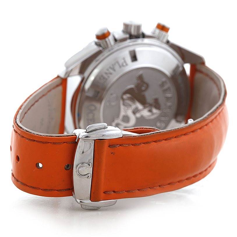The image shows the back view of the Omega Planet Ocean 2918.50.83 Men's Stainless Steel Black Dial 2918.50.83 Men's Stainless Steel Black Dial watch, highlighting its orange strap and metal clasp.