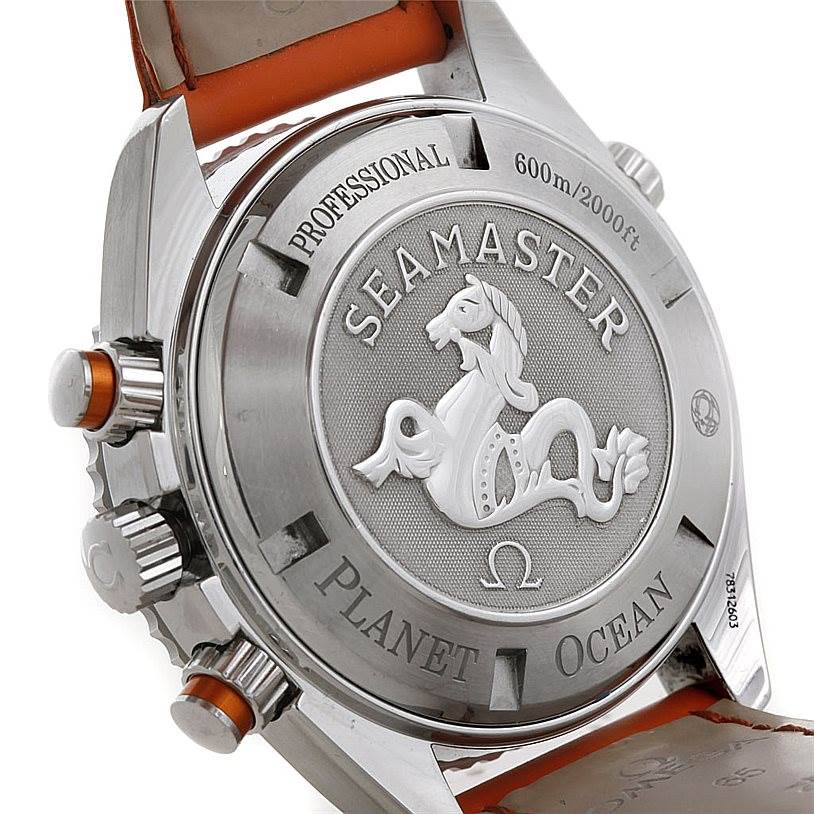 The image shows the backside of the Omega Planet Ocean 2918.50.83 Men's Stainless Steel Black Dial 2918.50.83 Men's Stainless Steel Black Dial Seamaster watch, highlighting the engraved case back and side buttons.