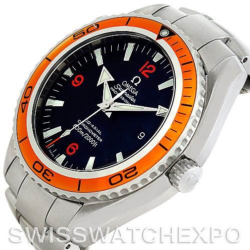 This image shows the Omega Planet Ocean 2208.50.00 Men
s Stainless Steel Black Dial 2208.50.00 Men
s Stainless Steel Black Dial watch from a front-angle view, highlighting its orange bezel and stainless steel bracelet.