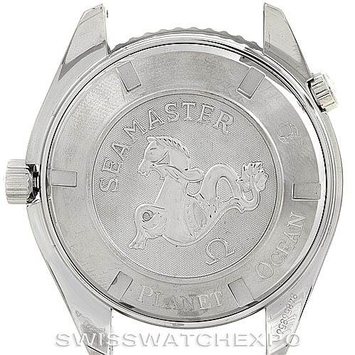The image shows the case back of an Omega Seamaster Planet Ocean watch, featuring the seamaster logo and text engravings.